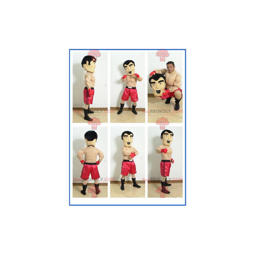 Mascota boxer sin camisa con pantalones cortos rojos -