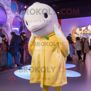 Gold Beluga Whale mascot costume character dressed with a Parka and Hair clips