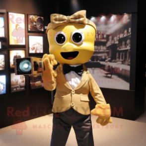 Gold Camera mascot costume character dressed with a Oxford Shirt and Bow ties
