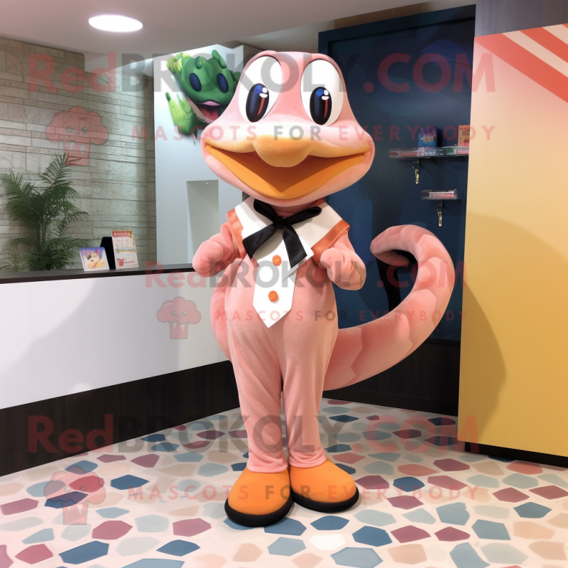 Peach Snake mascot costume character dressed with a Culottes and Bow ties Peach Snake mascot costume character dressed with a Culottes and Bow ties