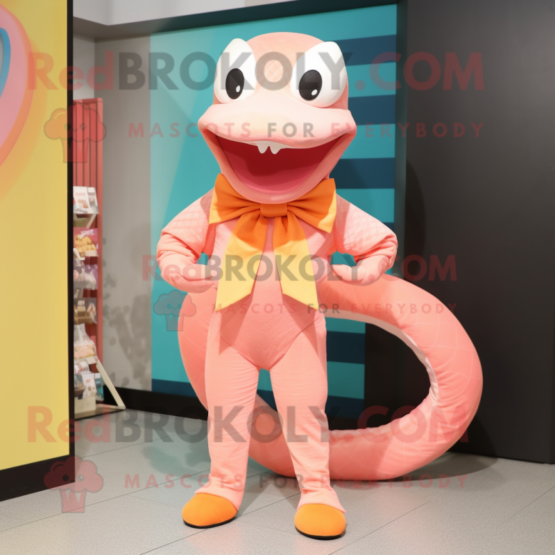 Peach Snake mascot costume character dressed with a Culottes and Bow ties Peach Snake mascot costume character dressed with a Culottes and Bow ties