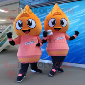 Peach Pair Of Ice Skates mascot costume character dressed with a Jumpsuit and Wraps