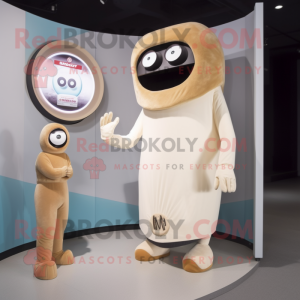 Beige Cyclops mascot costume character dressed with a A-Line Dress and Watches