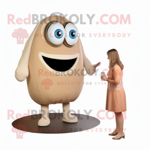 Beige Cyclops mascot costume character dressed with a A-Line Dress and Watches