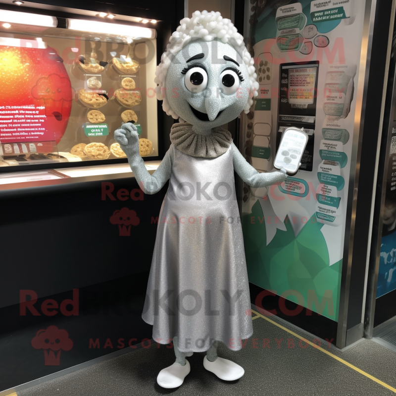 Silver Falafel mascot costume character dressed with a Shift Dress and Earrings Silver Falafel mascot costume character dressed with a Shift Dress and Earrings