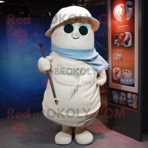 Cream Golf Bag mascot costume character dressed with a Jeans and Shawl pins