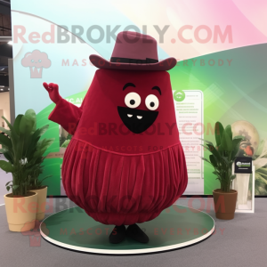 Maroon Watermelon mascot costume character dressed with a Maxi Skirt and Shawl pins