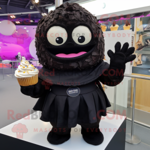 Black Cupcake mascot costume character dressed with a Hoodie and Clutch bags