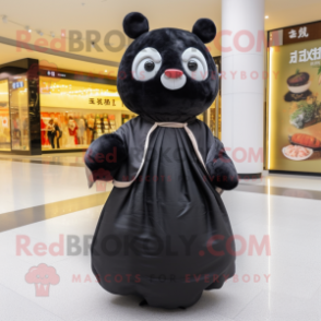Black Dim Sum mascot costume character dressed with a Maxi Skirt and Backpacks