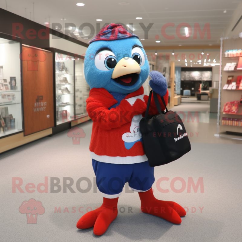 Red Blue Jay mascot costume character dressed with a Cardigan and Handbags Red Blue Jay mascot costume character dressed with a Cardigan and Handbags