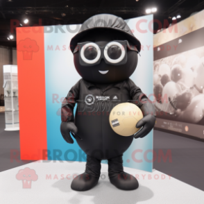 Black Handball Ball mascot costume character dressed with a Overalls and Reading glasses