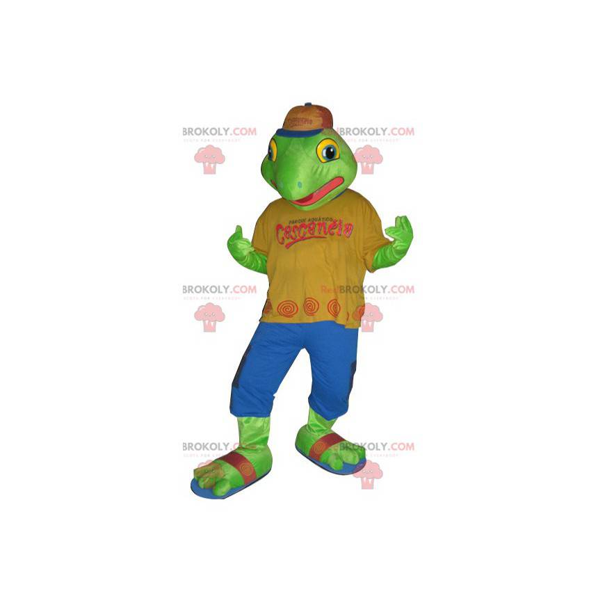 Green frog mascot dressed in a colorful outfit - Redbrokoly.com