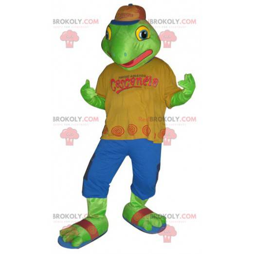 Groene kikker mascotte gekleed in een kleurrijke outfit -