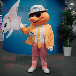 Peach Swordfish mascot costume character dressed with a Blazer and Caps