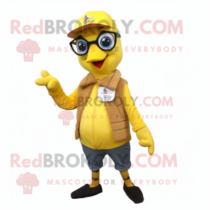 Lemon Yellow Woodpecker mascot costume character dressed with a Oxford Shirt and Mittens