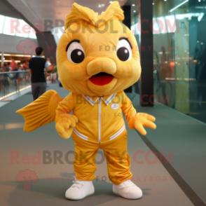 Gold Goldfish mascot costume character dressed with a Chinos and Shoe laces