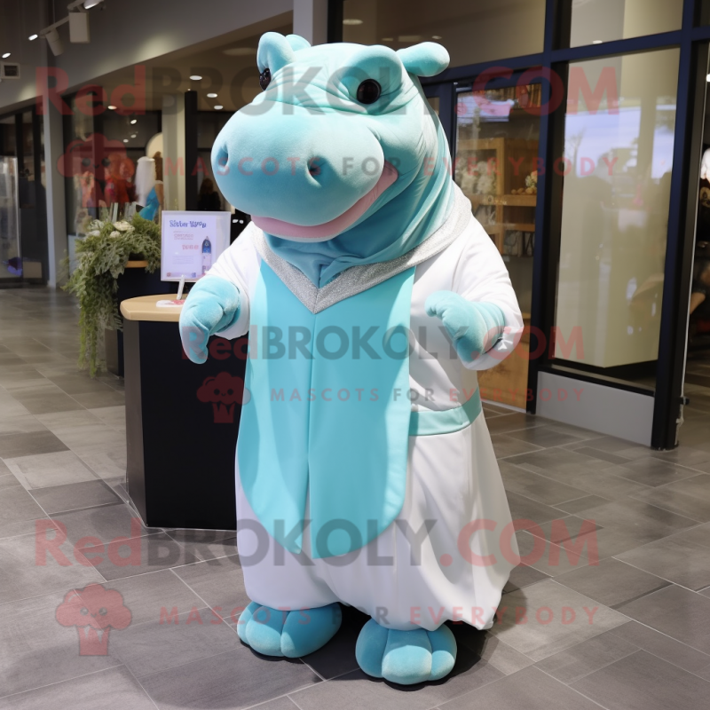 Cyan Hippopotamus mascot costume character dressed with a Wedding Dress and Tie pins Cyan Hippopotamus mascot costume character dressed with a Wedding Dress and Tie pins