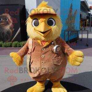 Rust Canary mascot costume character dressed with a Corduroy Pants and Keychains