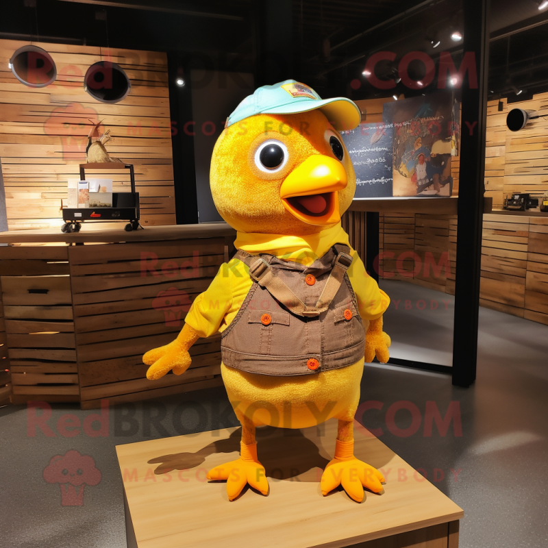 Rust Canary mascot costume character dressed with a Corduroy Pants and Keychains Rust Canary mascot costume character dressed with a Corduroy Pants and Keychains