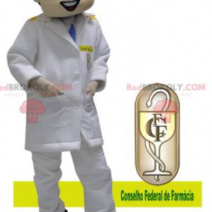 Mascotte medico vestito con un camice bianco - Redbrokoly.com