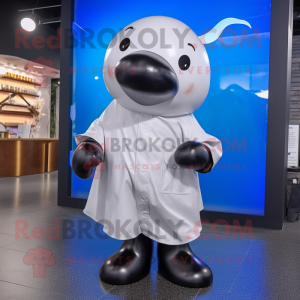 Black Beluga Whale mascot costume character dressed with a Raincoat and Belts