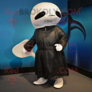 Black Beluga Whale mascot costume character dressed with a Raincoat and Belts
