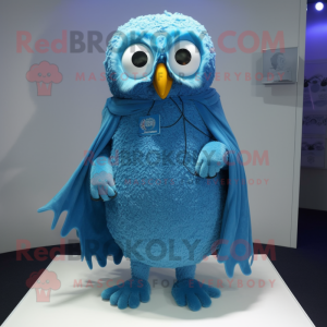 Blue Owl mascot costume character dressed with a Cover-up and Bracelets