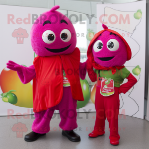 Magenta Tomato mascot costume character dressed with a Jumpsuit and Scarves