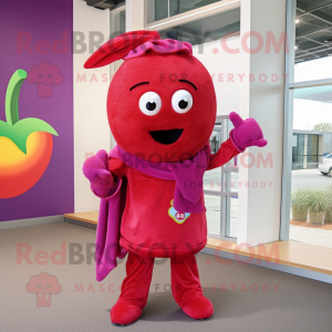 Magenta Tomato mascot costume character dressed with a Jumpsuit and Scarves