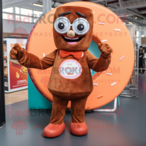 Rust Donut mascot costume character dressed with a Playsuit and Reading glasses