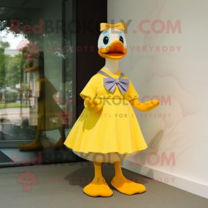 Yellow Geese mascot costume character dressed with a Dress and Bow ties