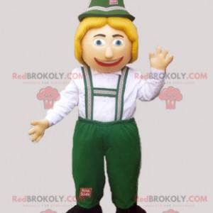 Tyrolean mascot in traditional green and white dress -