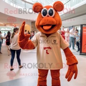 Tan Lobster Bisque mascot costume character dressed with a Polo Tee and Watches