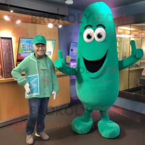 Teal Asparagus mascot costume character dressed with a Long Sleeve Tee and Watches