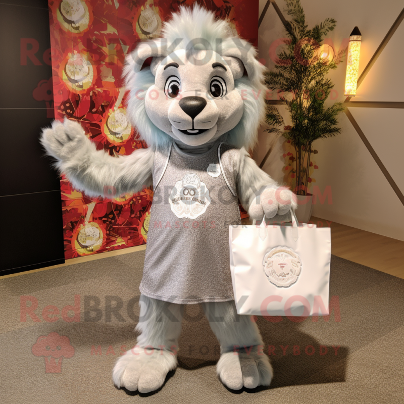 Silver Lion mascot costume character dressed with a Shift Dress and Tote bags