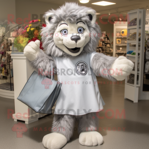 Silver Lion mascot costume character dressed with a Shift Dress and Tote bags