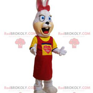 Hairy white rabbit mascot dressed in yellow and red -