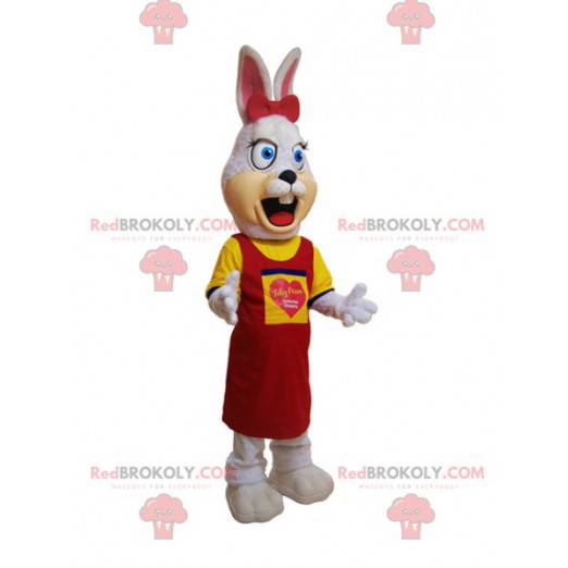 Hairy white rabbit mascot dressed in yellow and red -