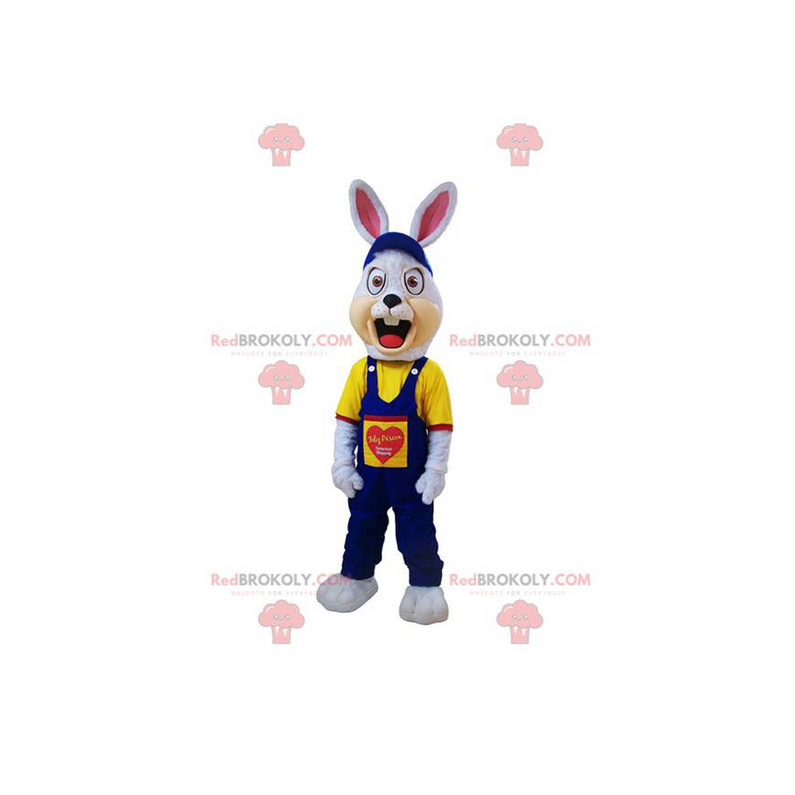 Angry white rabbit mascot dressed in blue overalls -