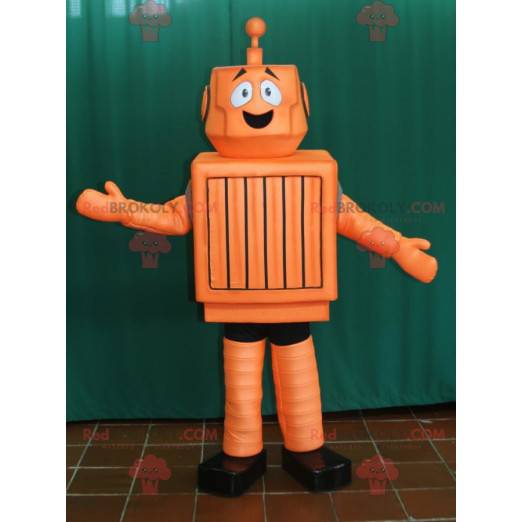 Mascotte robot arancione e nero carino e sorridente -
