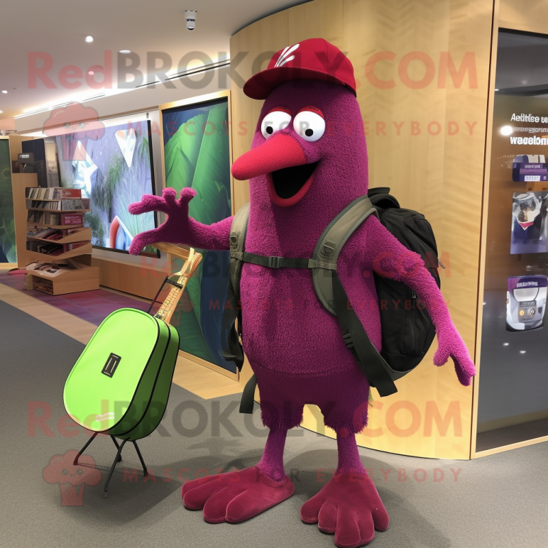 Magenta Kiwi mascot costume character dressed with a Bootcut Jeans and Messenger bags