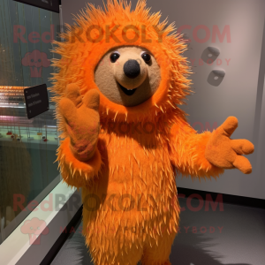 Orange Porcupine mascot costume character dressed with a Sweater and Mittens