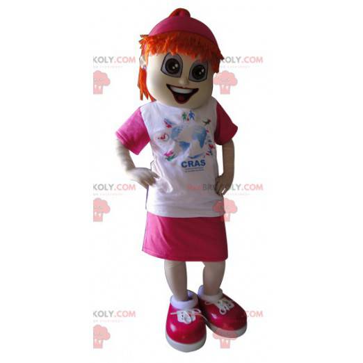 Roodharige meisje mascotte gekleed in roze en wit -