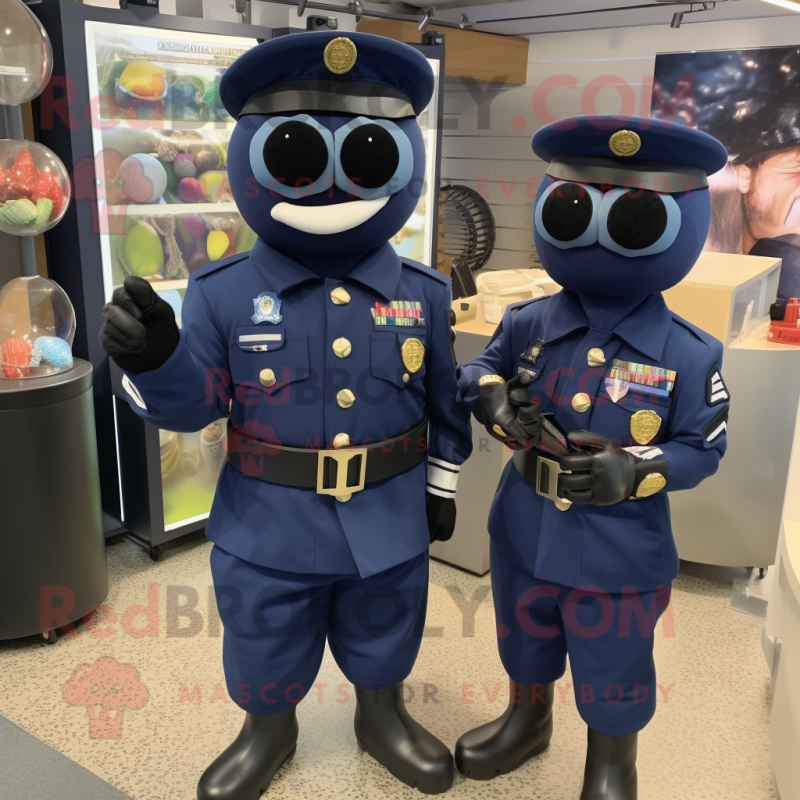 Navy Grenade mascot costume character dressed with a Jumpsuit and Earrings Navy Grenade mascot costume character dressed with a Jumpsuit and Earrings