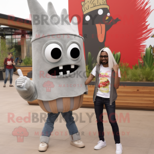 Gray Enchiladas mascot costume character dressed with a Flare Jeans and Clutch bags
