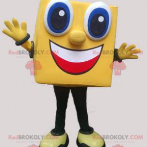 Mascote do boneco de neve amarelo quadrado e sorridente -