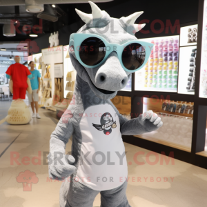 Gray Sea Horse mascot costume character dressed with a Graphic Tee and Sunglasses