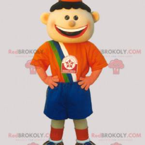 Mascota de niño de fútbol vestida de naranja y azul -