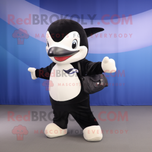 Cream Killer Whale mascot costume character dressed with a V-Neck Tee and Messenger bags