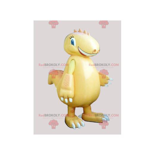 Mascotte di dinosauro giallo gigante e sorridente -